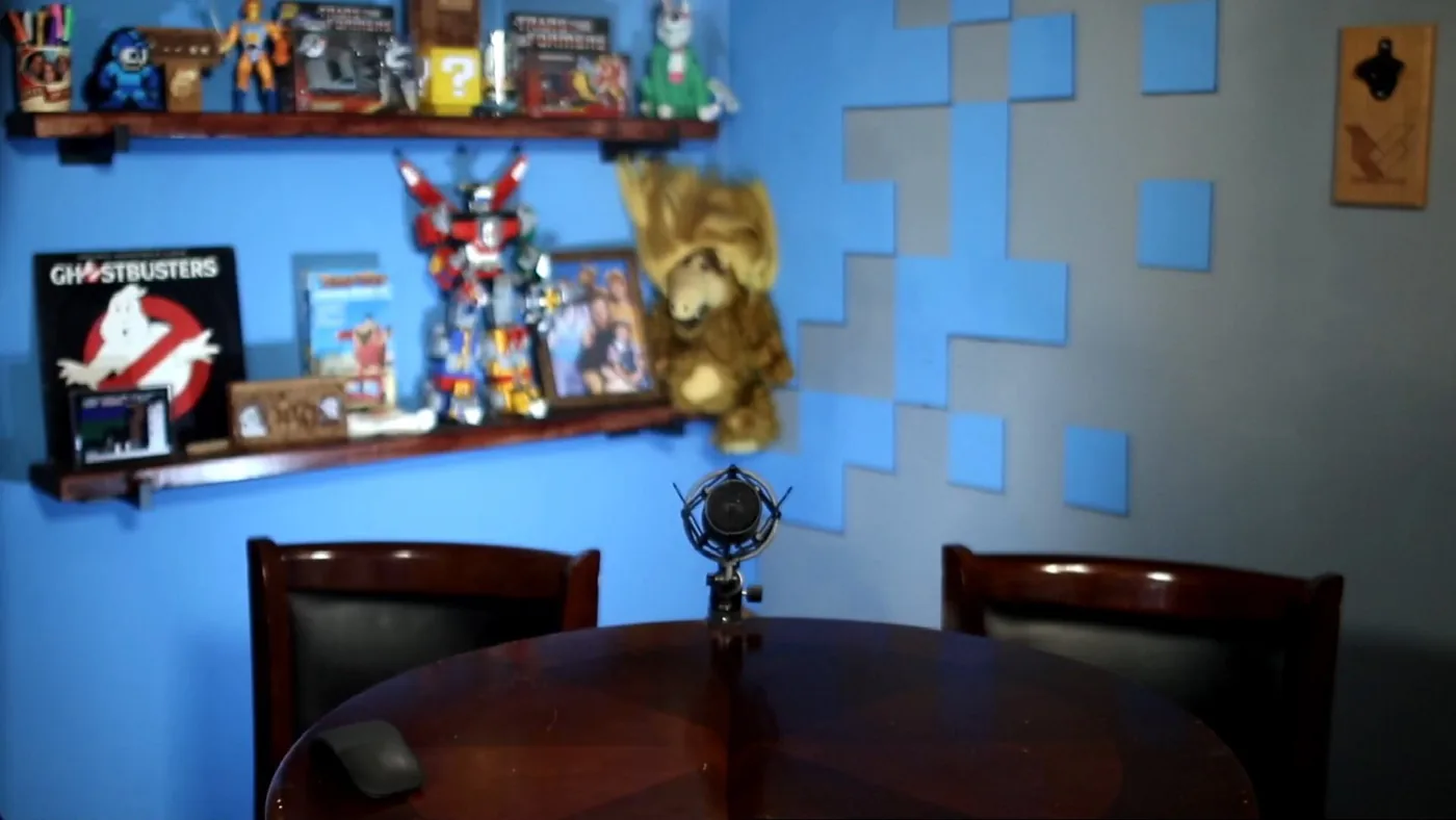 The Scanline Heroes studio set with collectibles and blue pixel lighting